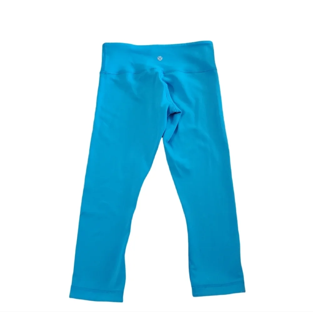 Lululemon Women's Wunder Under Reversible Blue/Aquamarine Crop Leggings‎ Size 4
